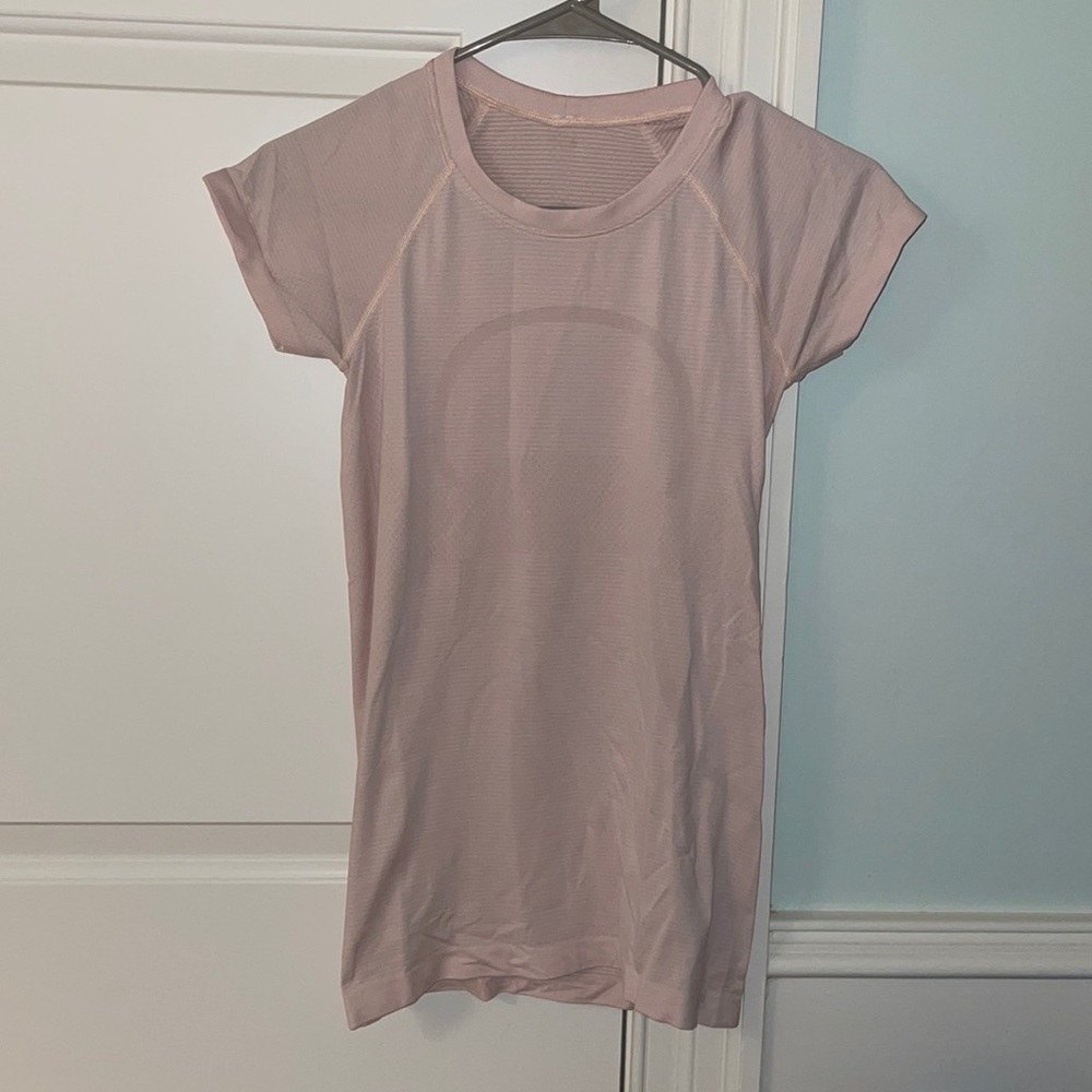 Light pink lululemon swiftly tech short sleeve shirt